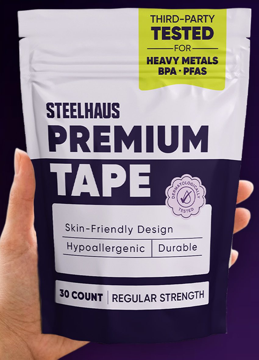 A hand holding a Steelhaus Premium Tape pouch labeled third-party tested